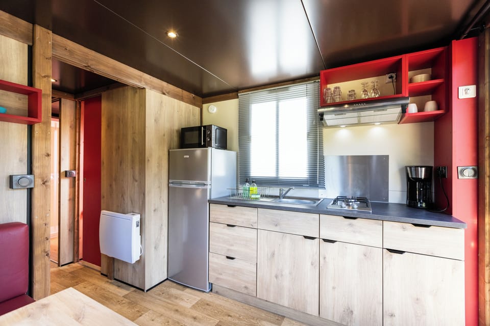 Chalet | Private kitchen | Stovetop, highchair, cookware/dishes/utensils