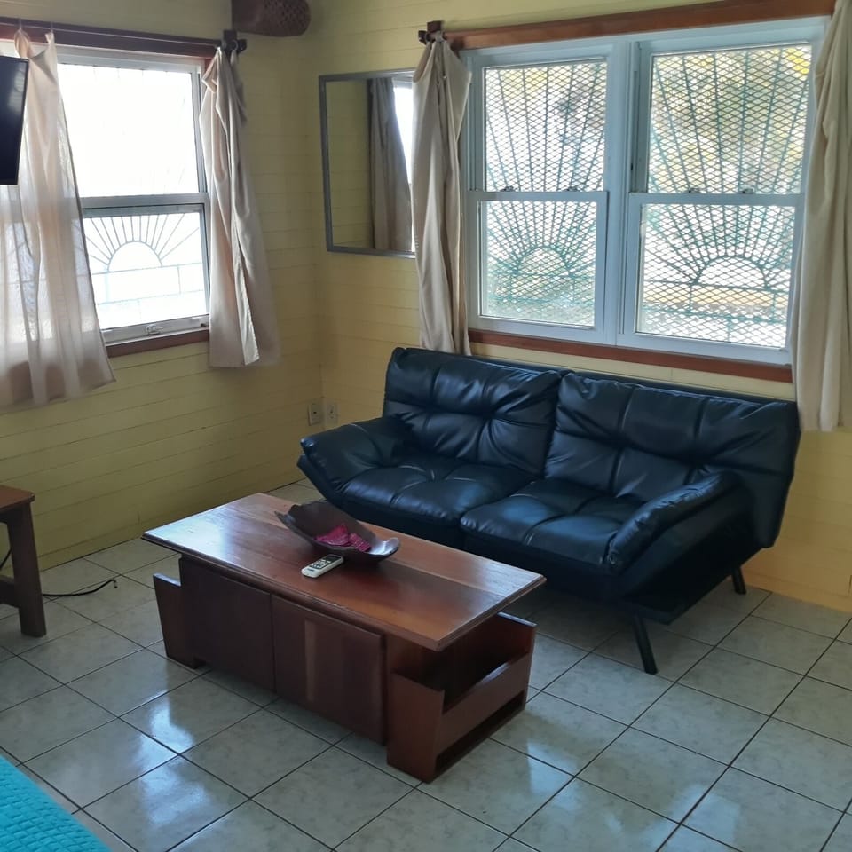 Cabin, Kitchen, Sea View | Living area | 32-inch TV with cable channels