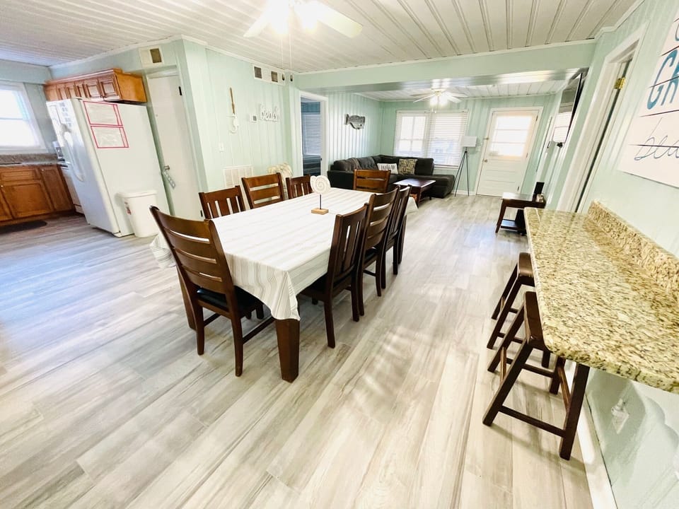 Large Dining area with side breakfast bar for more seating