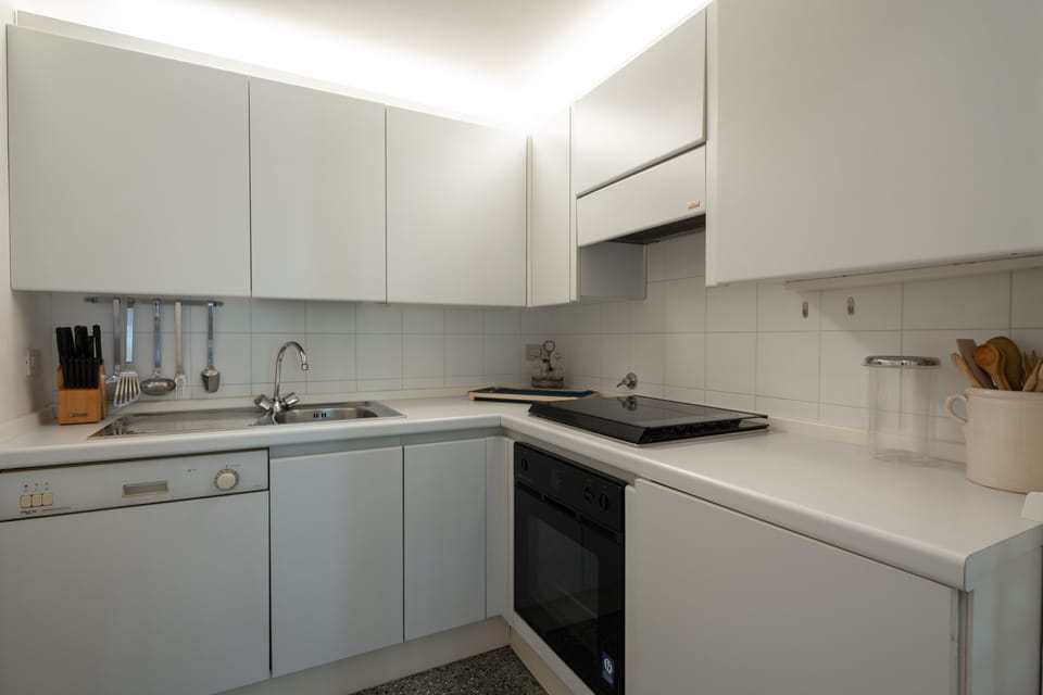 Apartment, 1 Bedroom | Private kitchen | Full-size fridge, oven, stovetop, dishwasher