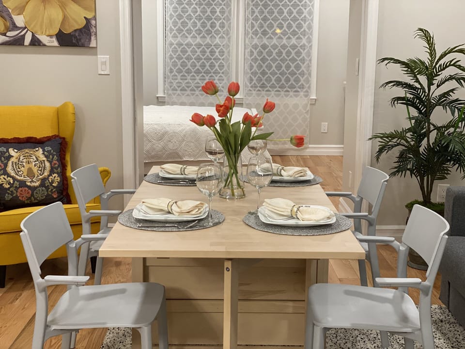 Foldable table and stackable chairs are stored in the closet.