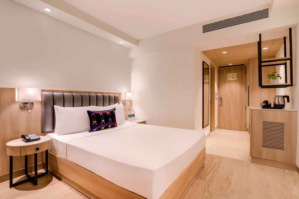 Deluxe Double Room | Minibar, in-room safe, iron/ironing board, free WiFi