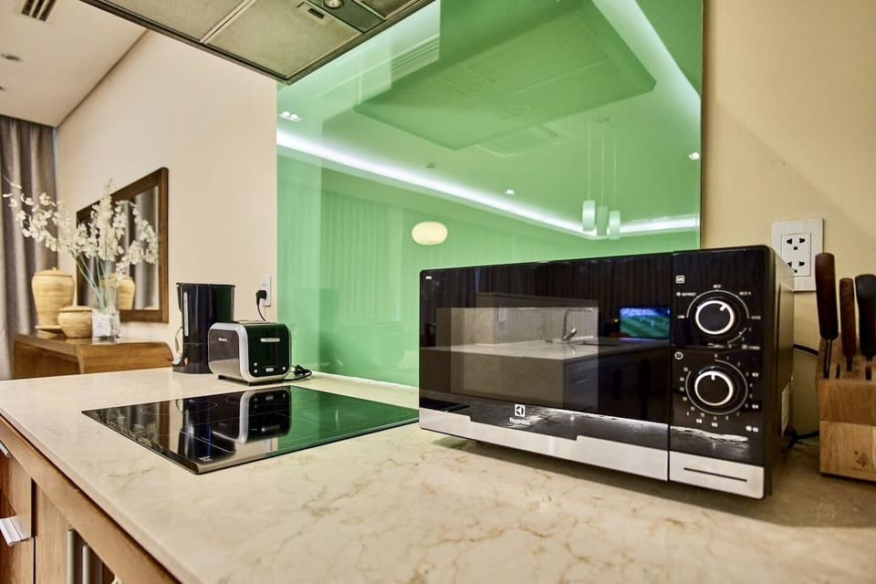 Family Villa, 4 Bedrooms | Private kitchen | Coffee/tea maker, fridge, microwave, stovetop