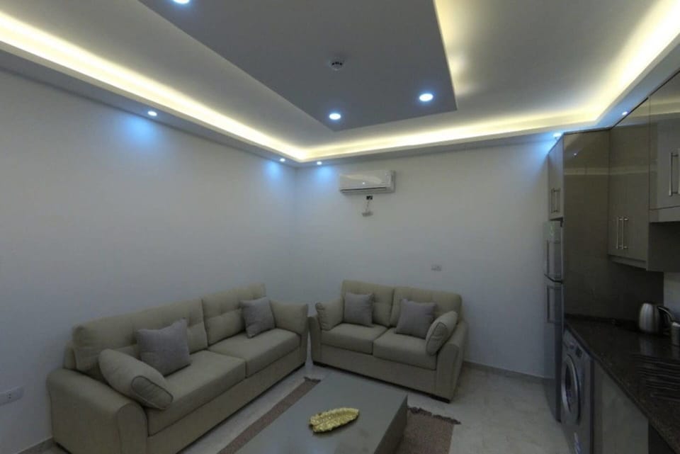 Apartment | Living room | 30-inch TV with satellite channels