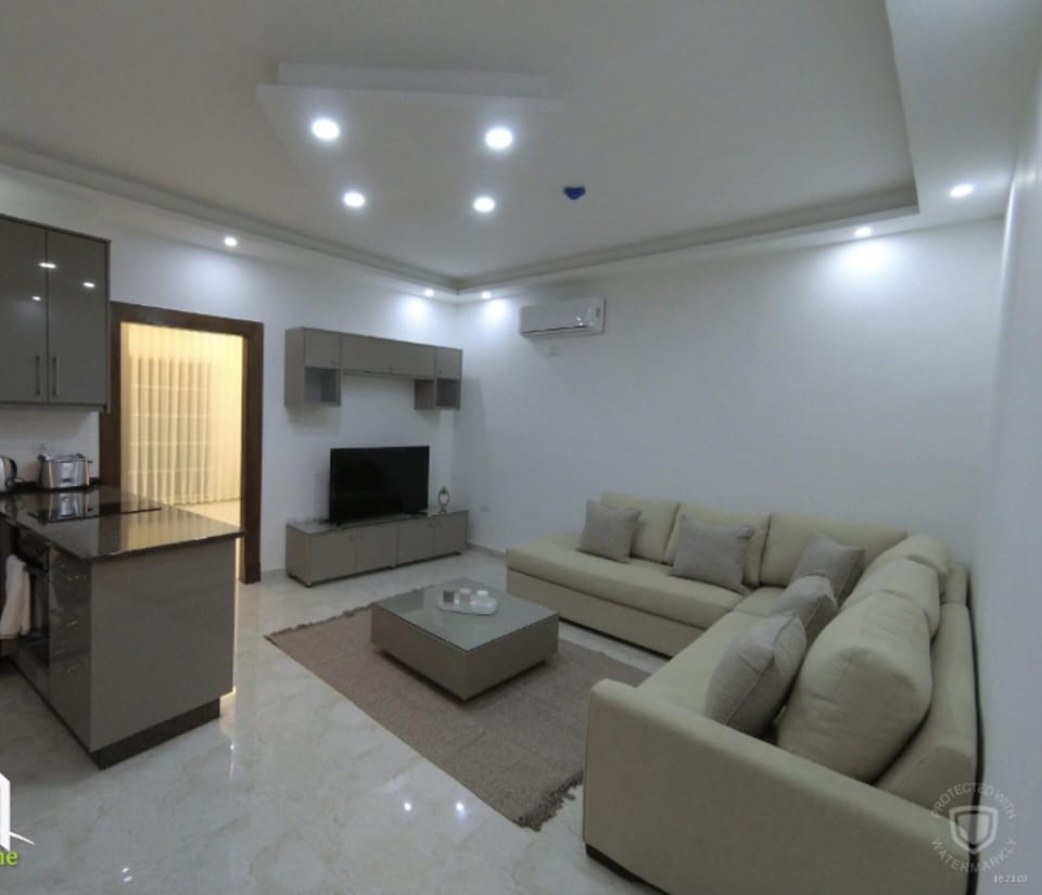 Apartment | Living area | 30-inch TV with digital channels