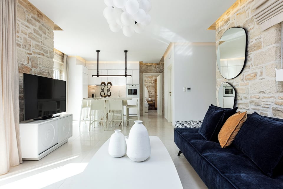 Open plan living area consisting of the living room and the kitchen