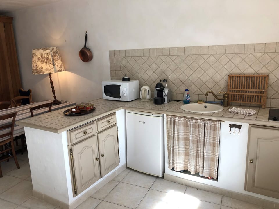 Loft, 2 Bedrooms | Private kitchen | Fridge, microwave, stovetop, coffee/tea maker