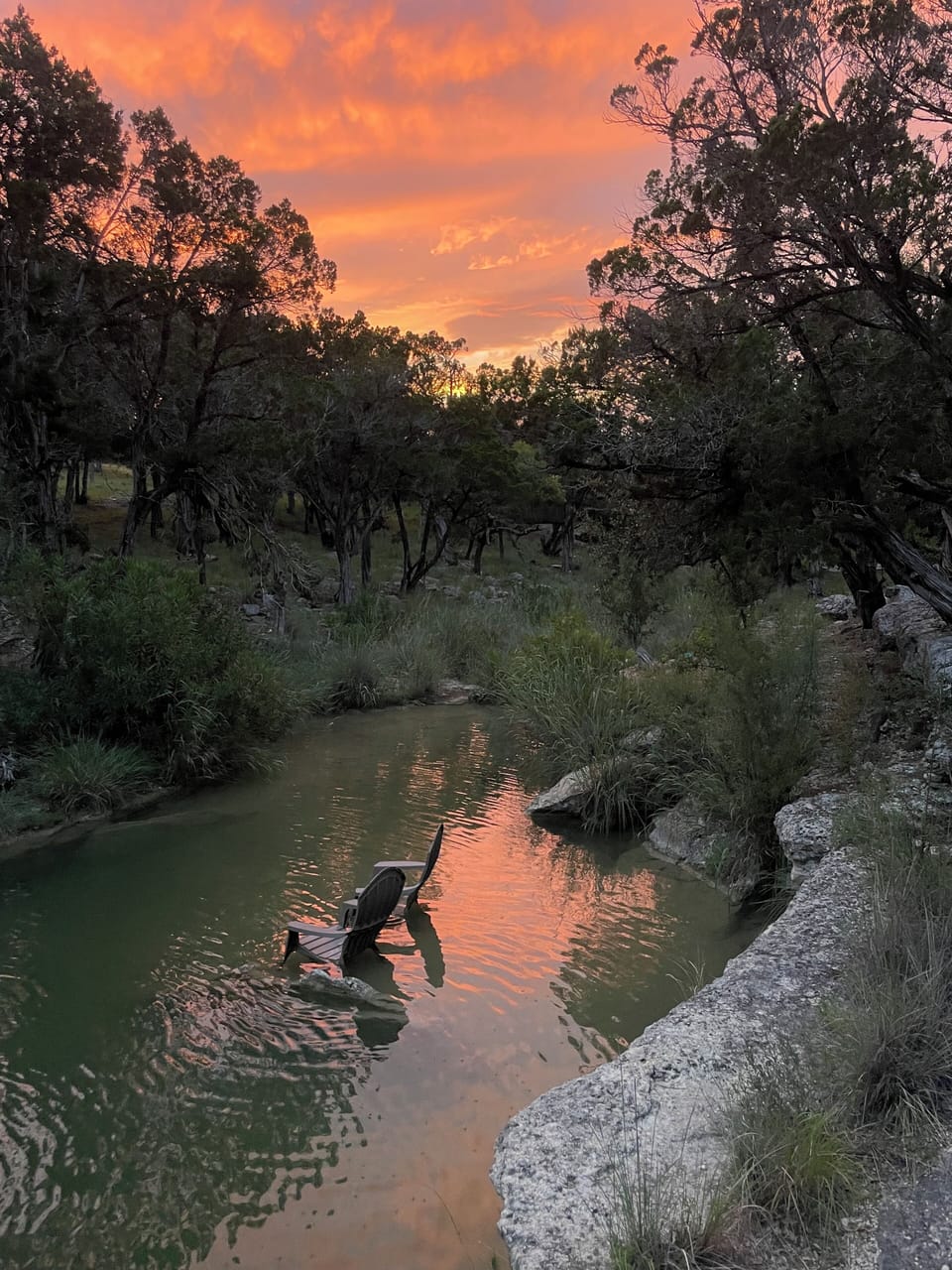 Sunset in the grotto. The shallow area is perfect to relax in lawn chairs