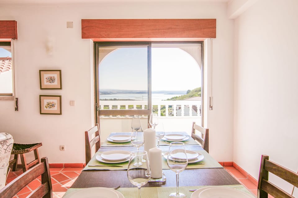 Dining room area leading on to terrace with extra seating options