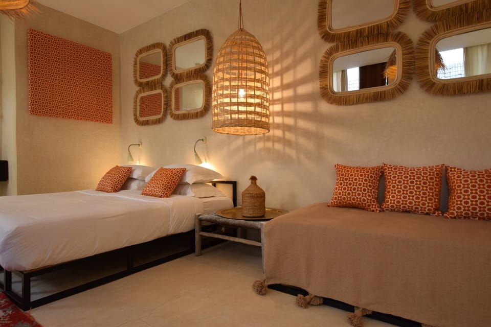 Deluxe Quadruple Room | Premium bedding, down comforters, individually furnished, free WiFi