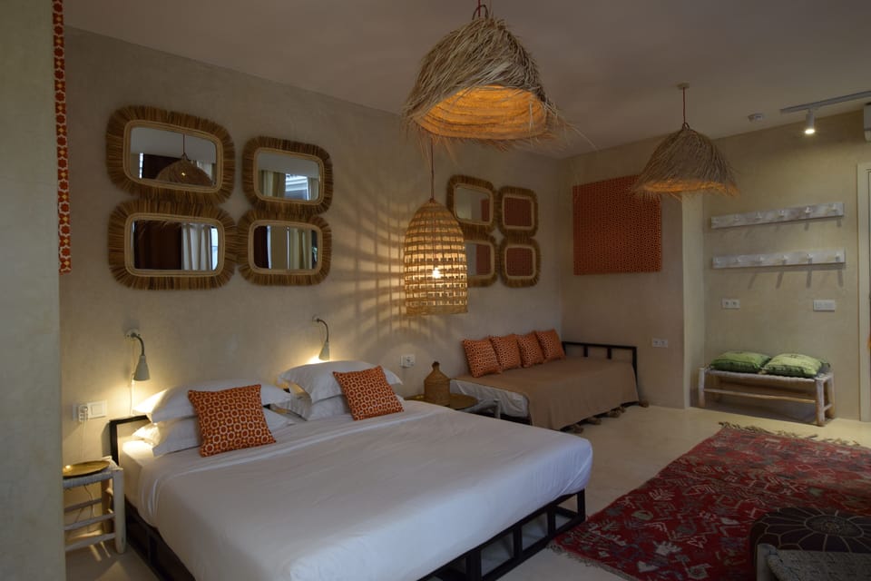 Deluxe Quadruple Room | Premium bedding, down comforters, individually furnished, free WiFi