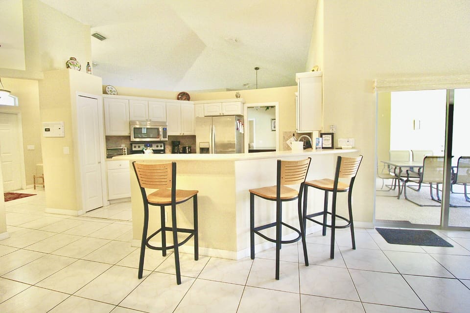 Enjoy the bar counter with seating for three.
