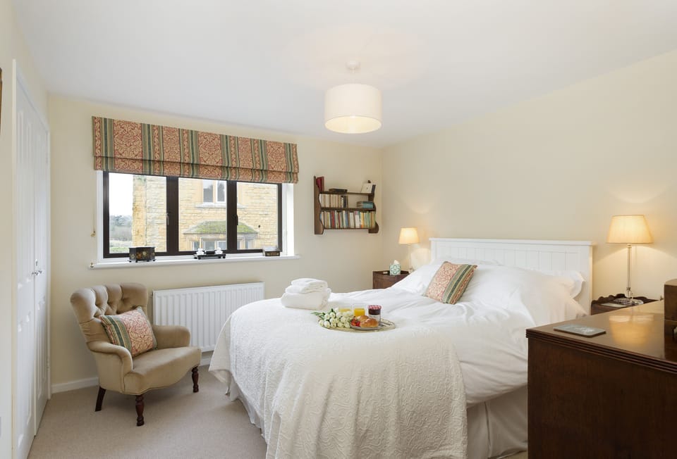 First floor: Bedroom with 5' king-size bed and ample storage