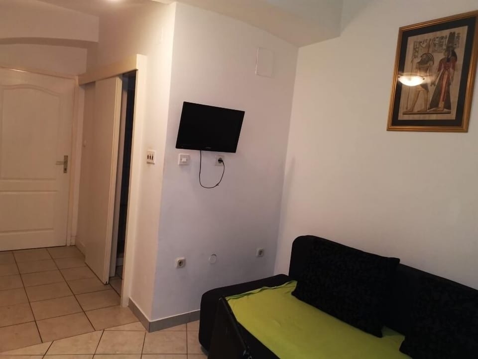 Apartment, 1 Bedroom | Living area | Flat-screen TV