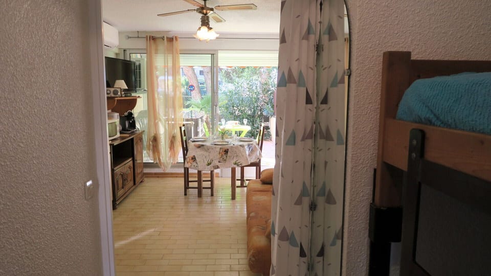Entrance to the studio overlooking the living room and the terrace