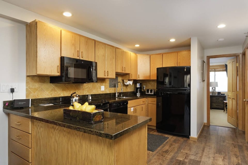 The open living and dining area make this condo a great place to gather with family and friends.