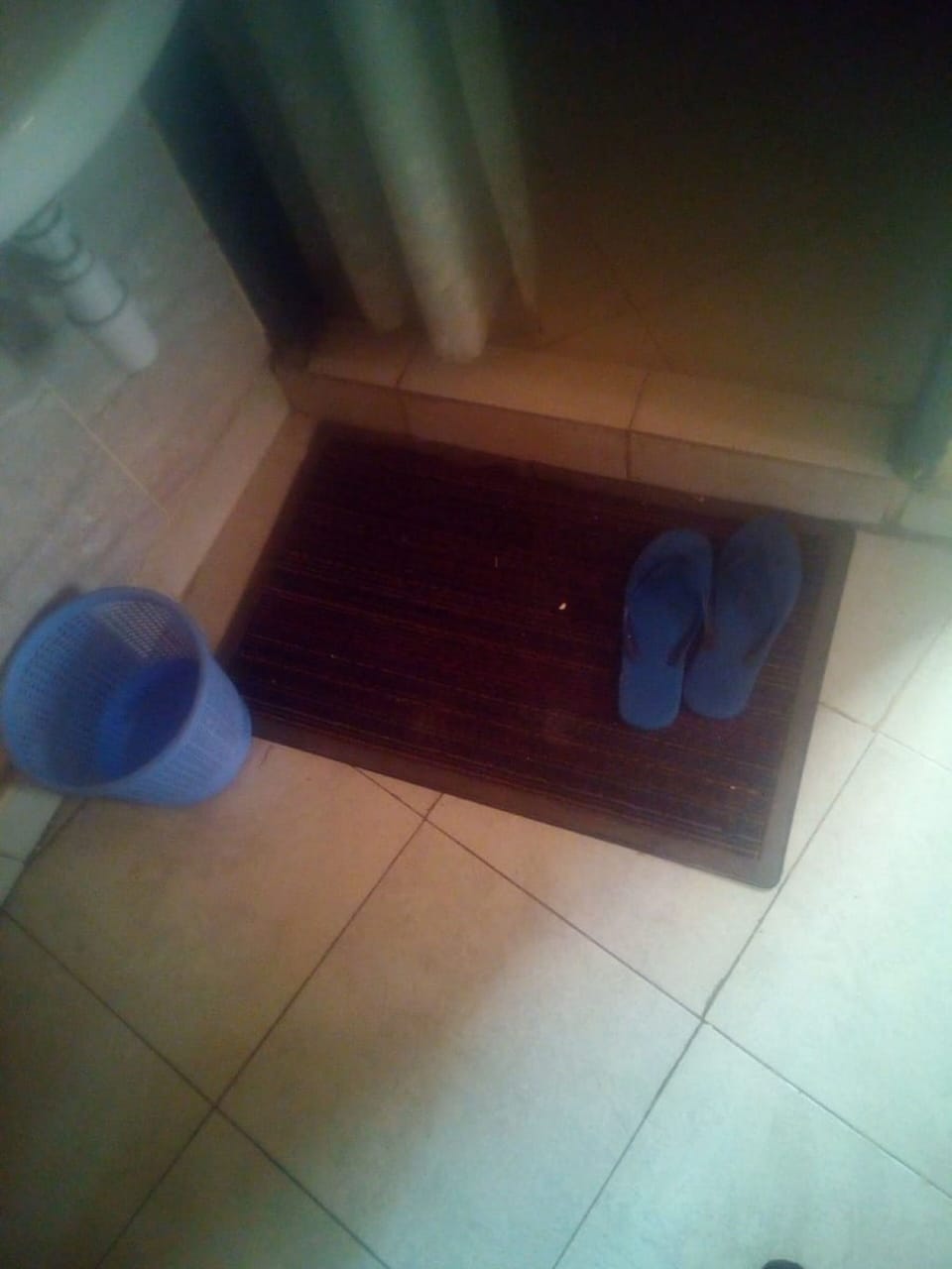 Shower, slippers, towels, soap