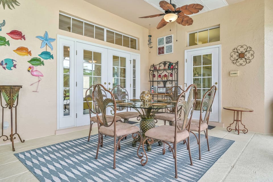 VILLA MARGARETHA - Private heated pool with waterfall, covered outdoor seating and dining area, lounge area and BBQ Grill complete the large screened lanai.