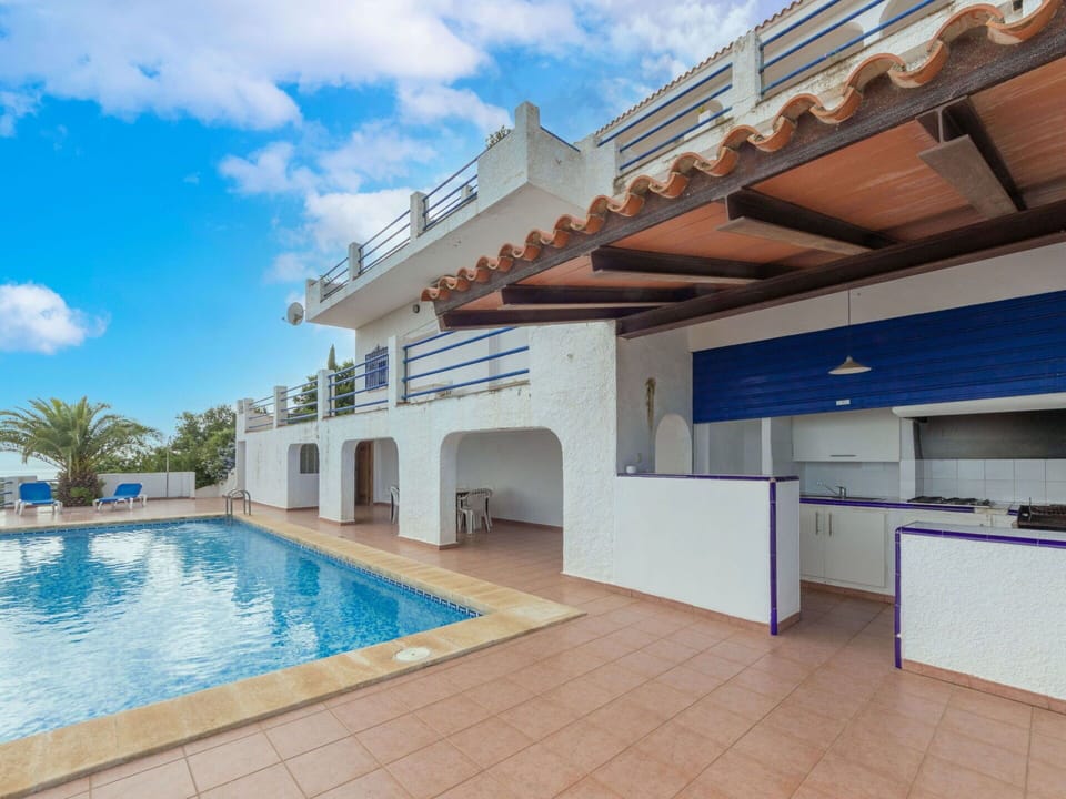 Cloud, Water, Sky, Property, Blue, Swimming Pool, Building, Shade, Interior Design, House