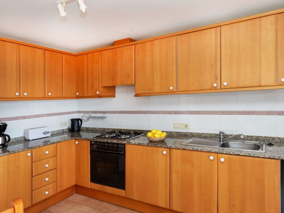 Cabinetry, Countertop, Property, Kitchen Sink, Sink, Kitchen, Wood, Kitchen Appliance, Interior Design, Kitchen Stove