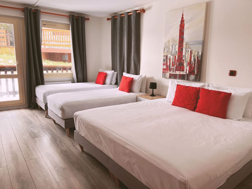 Family Room | Blackout drapes, free cribs/infant beds, free WiFi, bed sheets