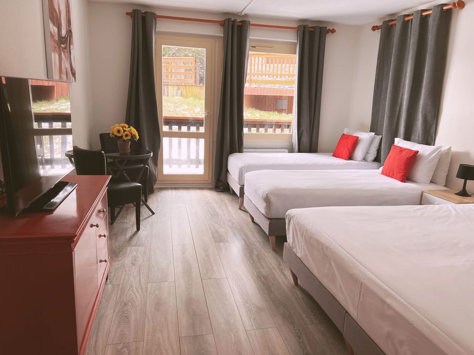 Family Room | Blackout drapes, free cribs/infant beds, free WiFi, bed sheets