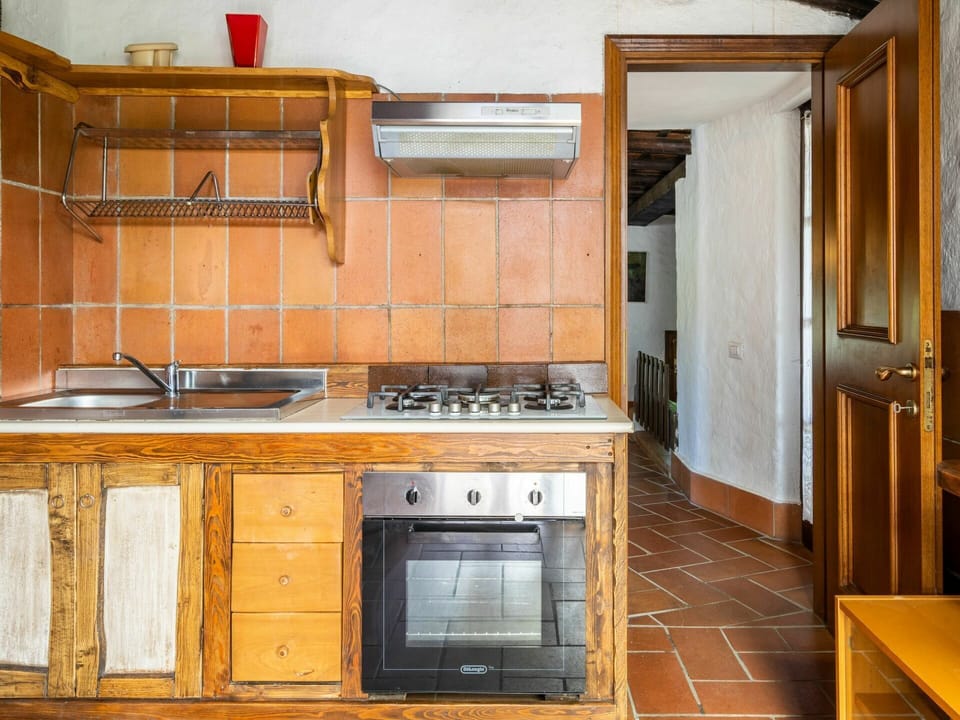Room, Kitchen, Property, Countertop, Cabinetry, Furniture, Kitchen Stove, House, Building, Major Appliance