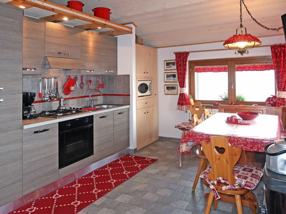 Room, Countertop, Property, Kitchen, Interior Design, Furniture, Red, Building, Cabinetry, Tile