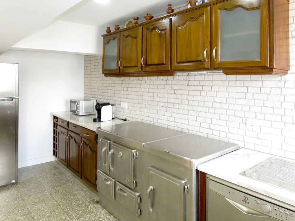 Cabinetry, Countertop, Property, Furniture, Building, Kitchen, Kitchen Stove, Wood, Drawer, Flooring