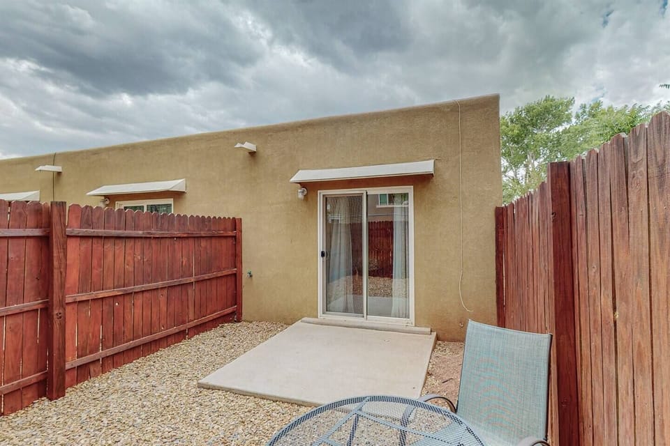 Sliding glass door with fully fenced backyard space available for guests and pets