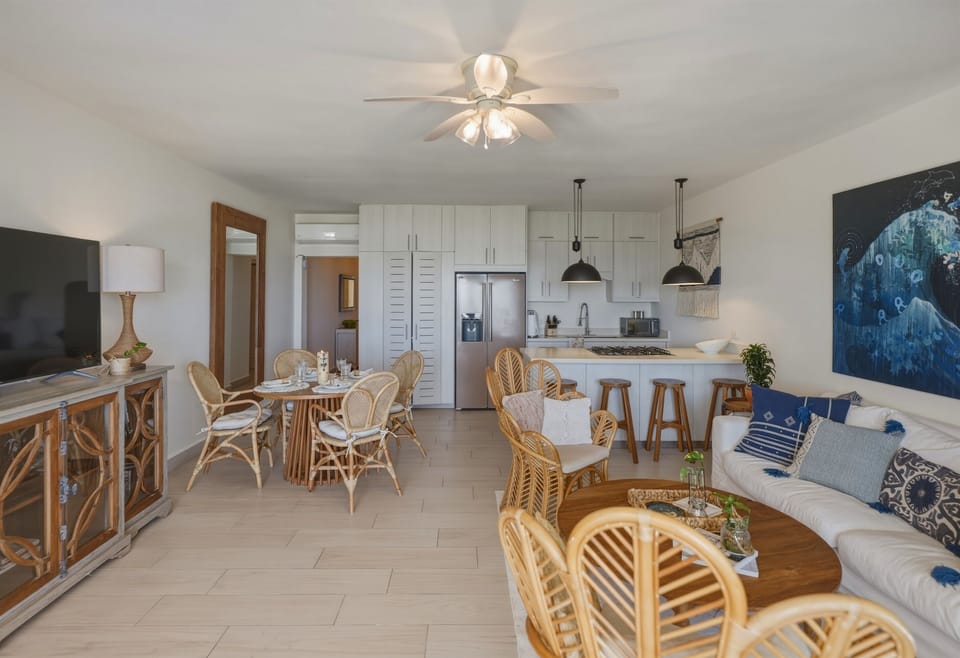 A spacious area where mornings start slow and evenings come together. Share meals, unwind, and enjoy the comfort of an airy beach home.