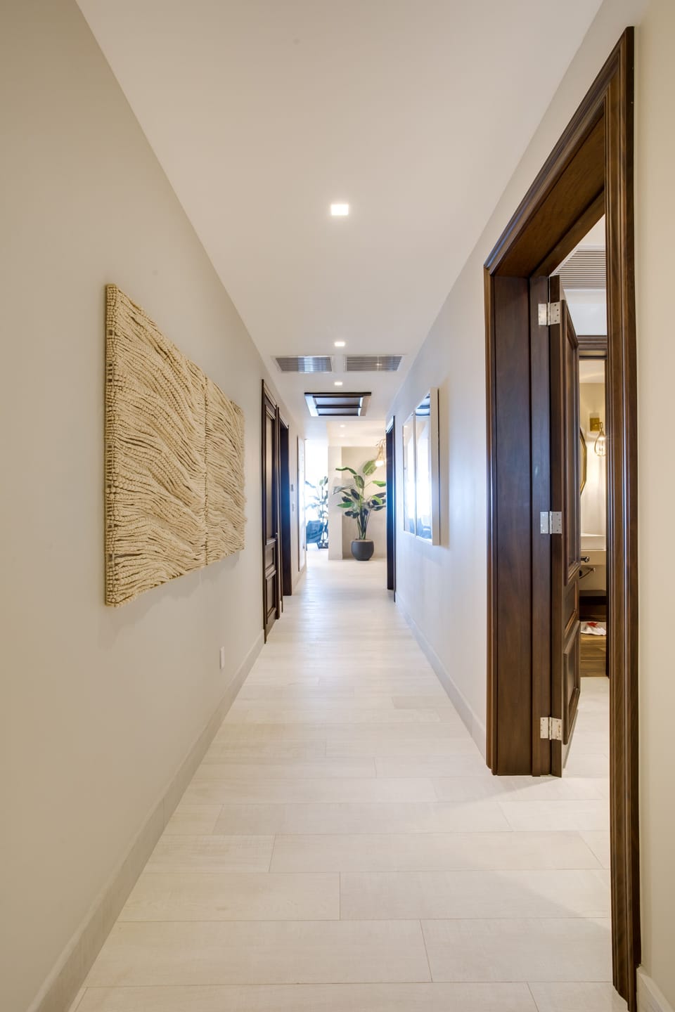Hallway to bedrooms and back patio