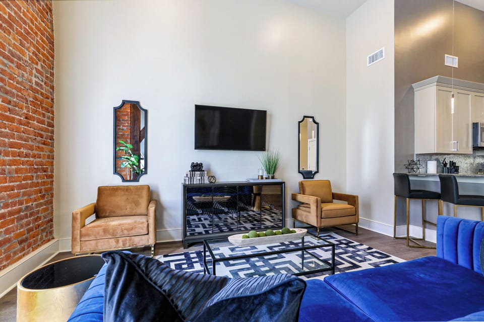 Open-concept living, kitchen, and dining area with ample seating for you and your guests. 55” Samsung Smart 4K TV for streaming and DIRECTV Entertainment. Dining table seats four. Enjoy plenty of natural light!