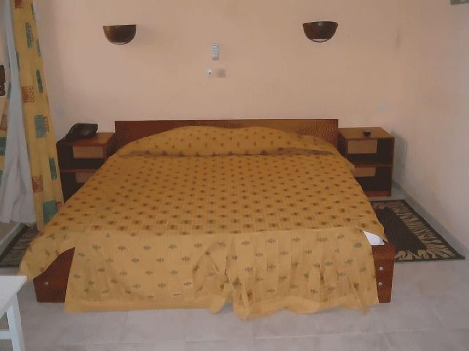 Desk, blackout drapes, WiFi (free), bed sheets
