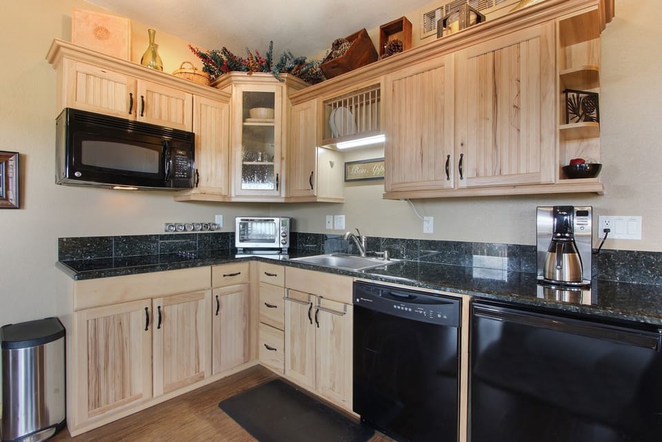 Condo, 1 Bedroom | Private kitchen | Fridge, microwave, dishwasher, coffee/tea maker