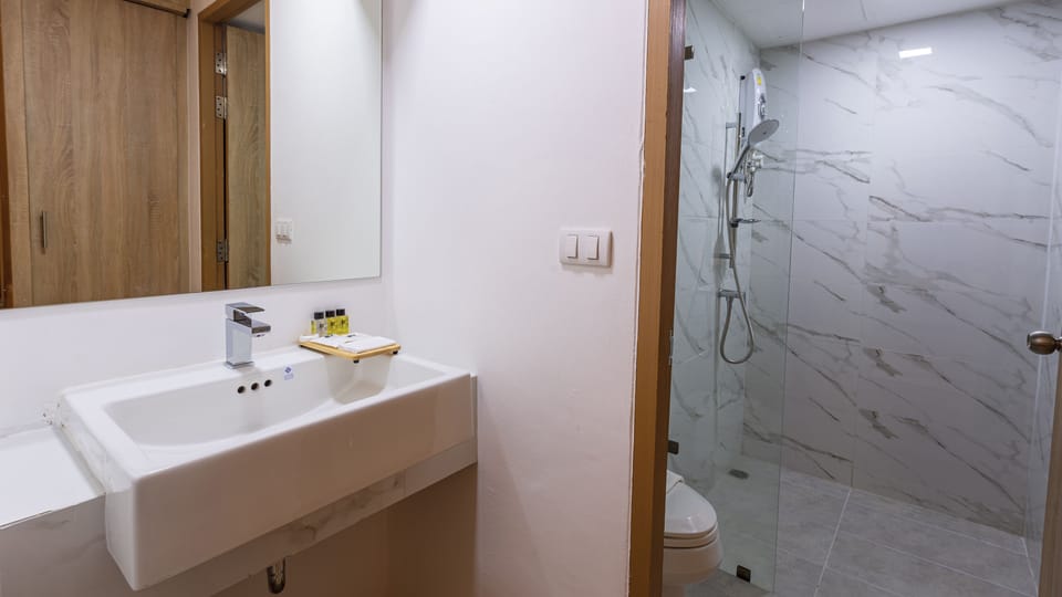 Shower, towels, soap, shampoo