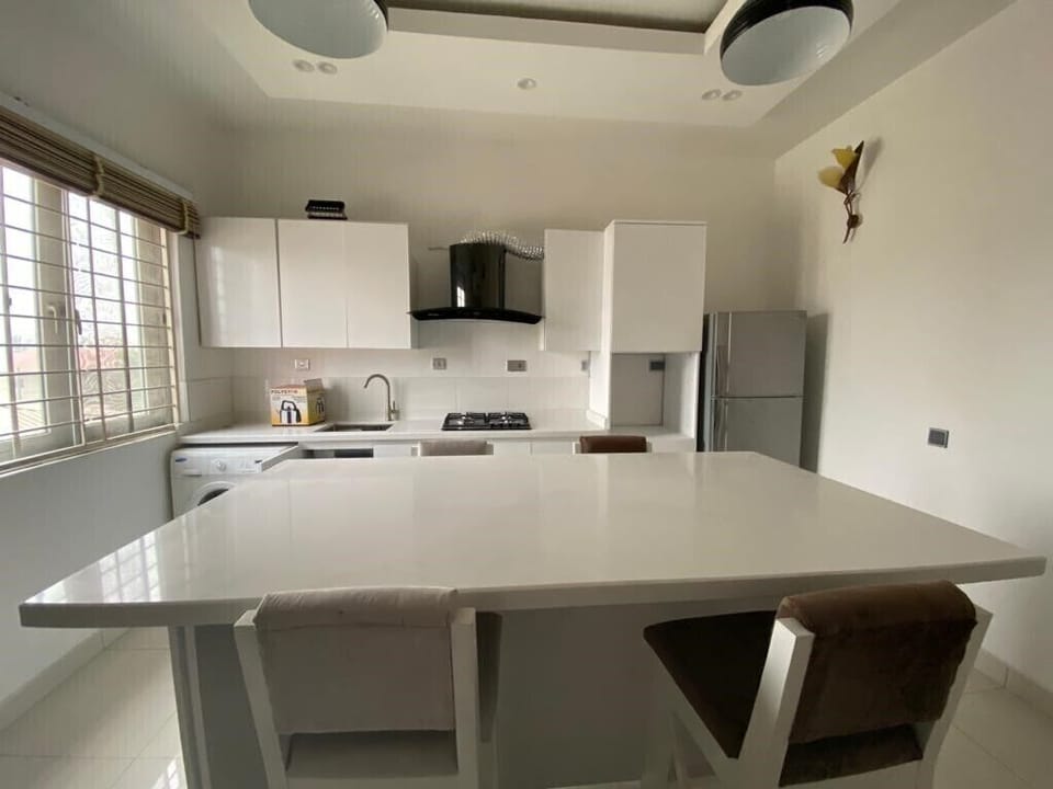 Apartment, 2 Bedrooms | Private kitchen | Full-size fridge, microwave, coffee/tea maker, cookware/dishes/utensils