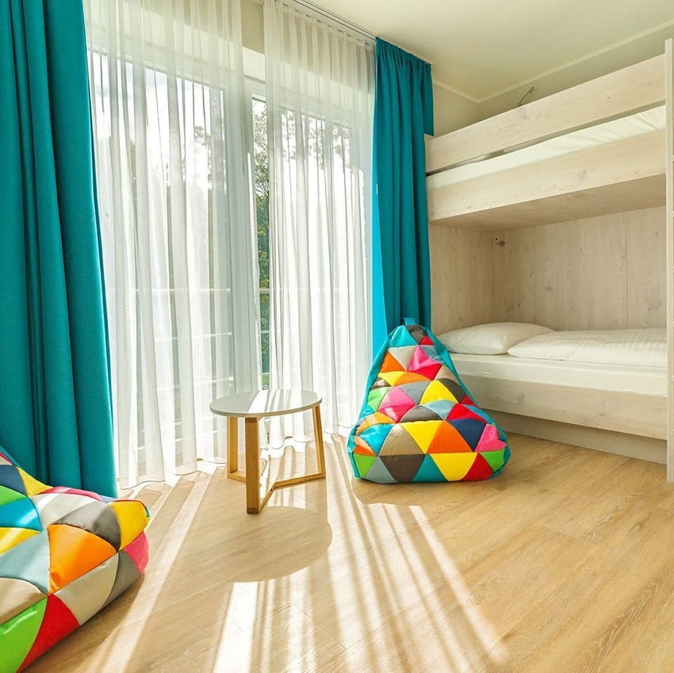 Family Room | Hypo-allergenic bedding, minibar, in-room safe, desk