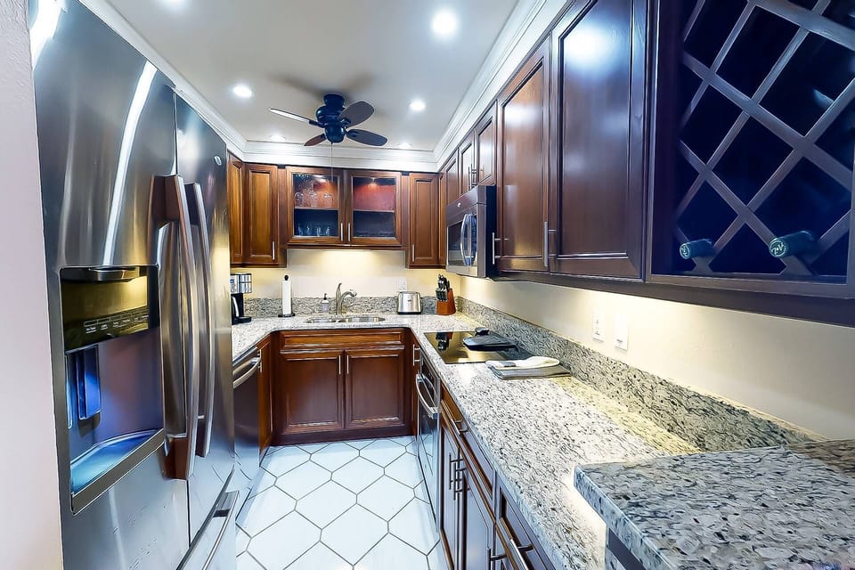 Beautiful updated kitchen with granite and high end stainless appliances.  Wine rack too!