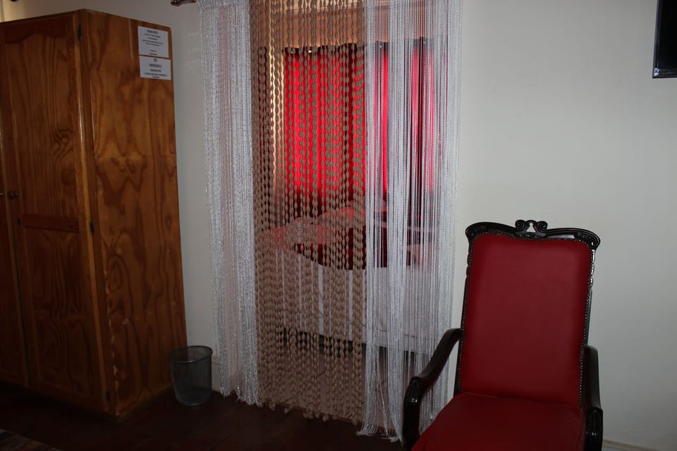 Double Room (Self catering) | Living area | TV