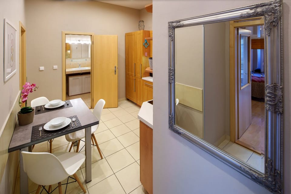 Entry with kitchen with dining table