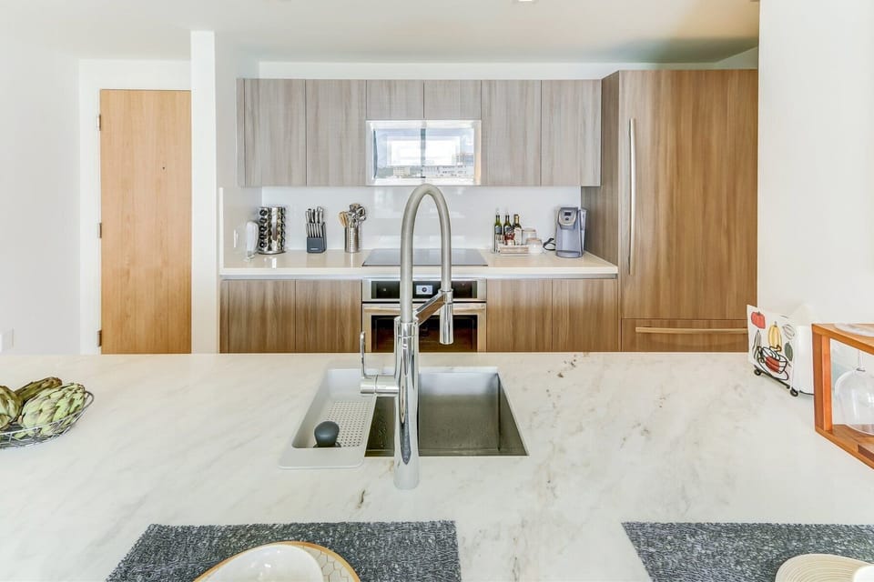 Modern kitchen appliances include electric range & convection oven