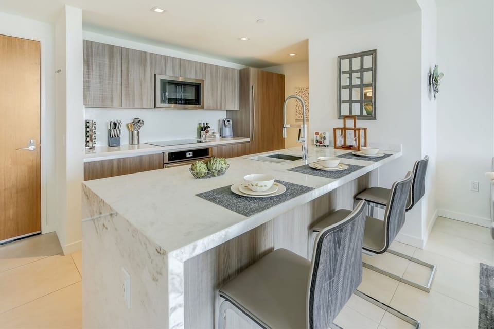 Waterfall peninsula features three extra counter stools