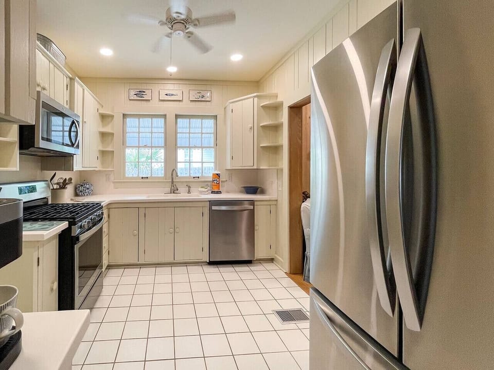 Fully equipped kitchen located at the back of the house