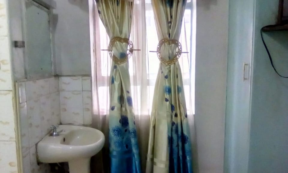 Shower, rainfall showerhead, towels, soap
