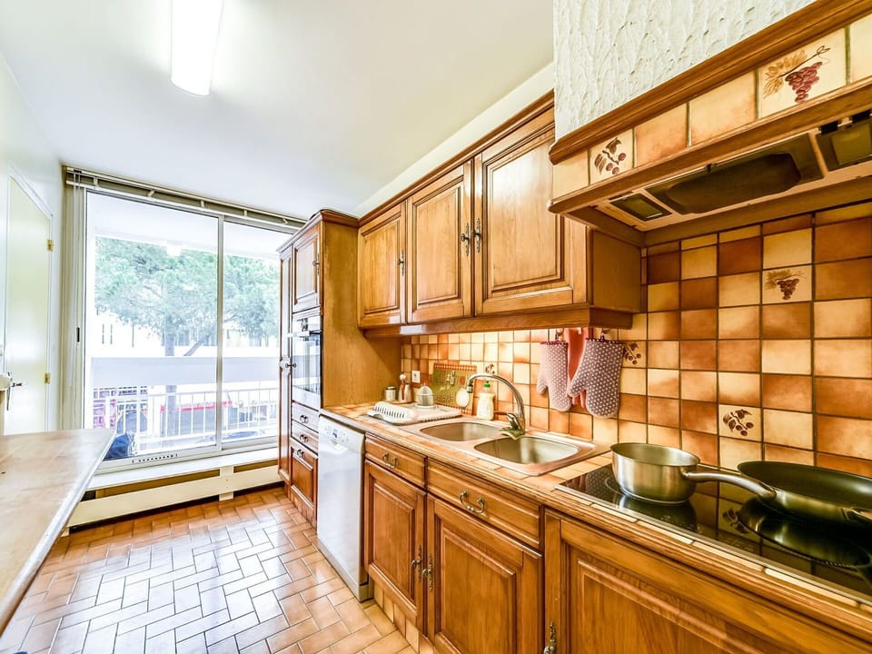 Property, Room, Countertop, Building, Kitchen, Furniture, Cabinetry, Interior Design, Yellow, House