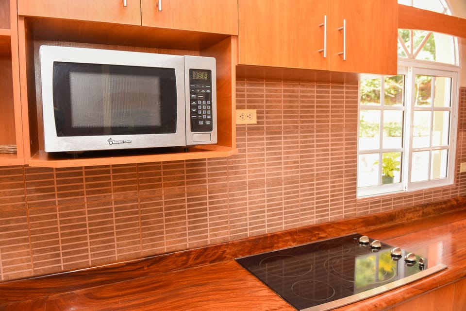Family Villa | Shared kitchen | Coffee/tea maker, full-size fridge, microwave, oven