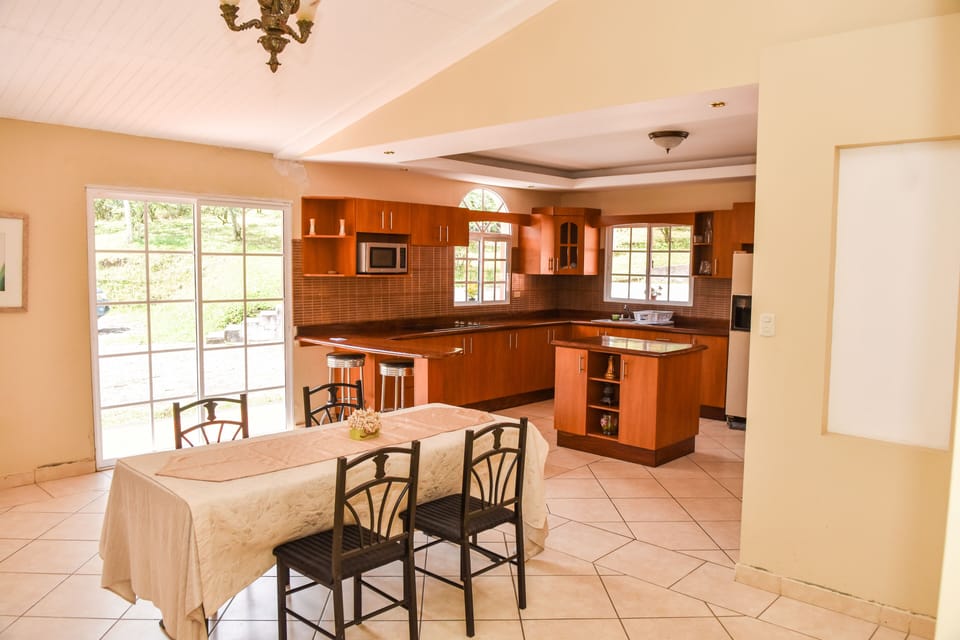 Family Villa | Shared kitchen facilities | Coffee/tea maker, full-size fridge, microwave, oven