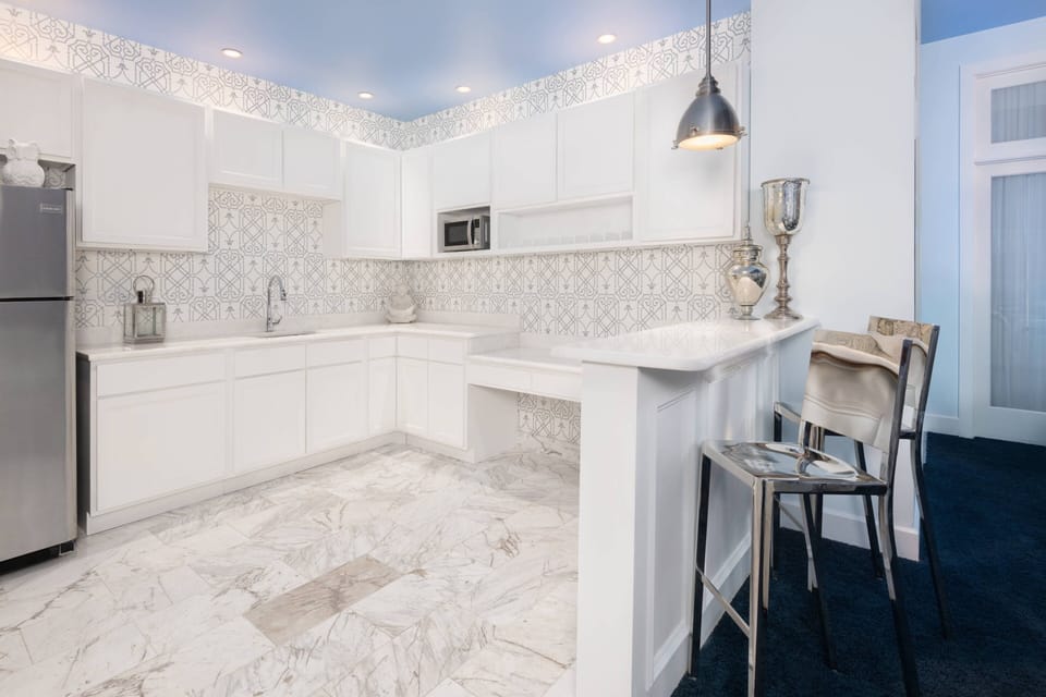 Executive Suite, 2 Bedrooms | Premium bedding, down comforters, in-room safe, desk