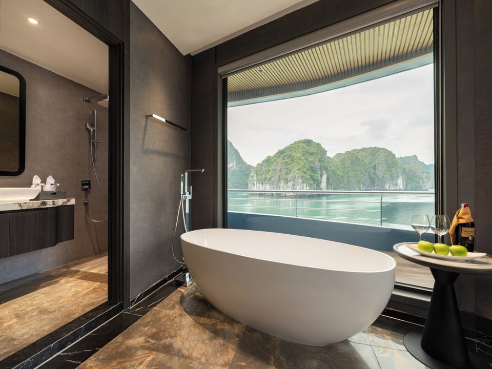Separate tub and shower, rainfall showerhead, free toiletries